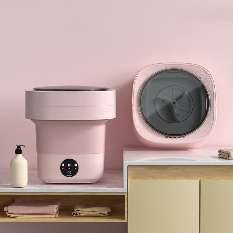 Mini Foldable Washing Machine and portable laundry washer in soft pink, ideal for compact living and travel.