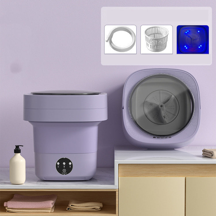 Mini Foldable Washing Machine displayed on a countertop, showcasing its compact design and accessories.