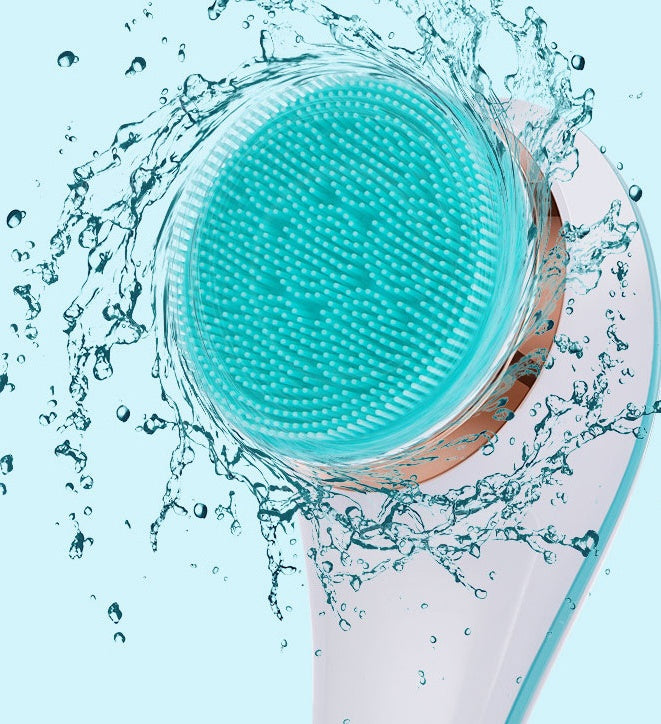 Electric Bath Brush splashing with water, showcasing its silicone scrubber design for deep cleansing.