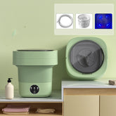 Mini Foldable Washing Machine in green color, showcasing its portable design and features on a countertop.